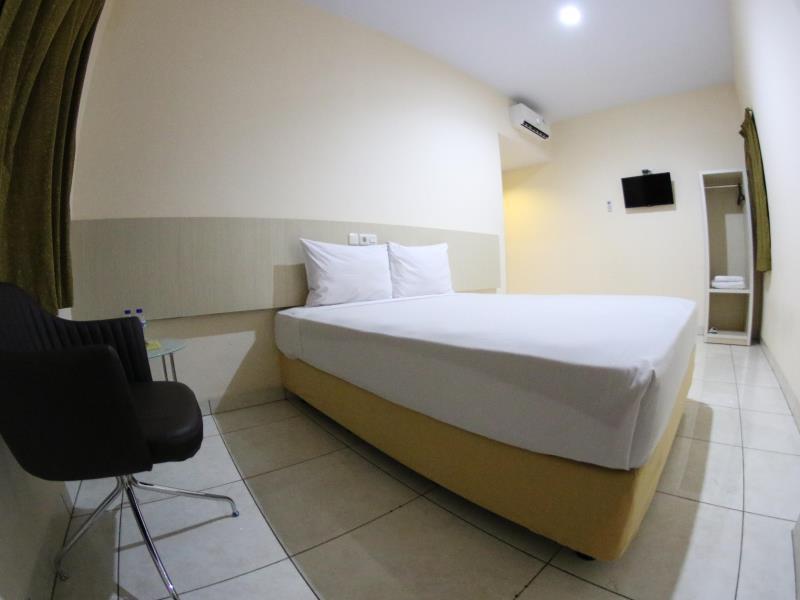 Daya Hotel Makassar Bagian luar foto